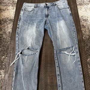 CAbi Women’s Light Blue Distressed Jeans